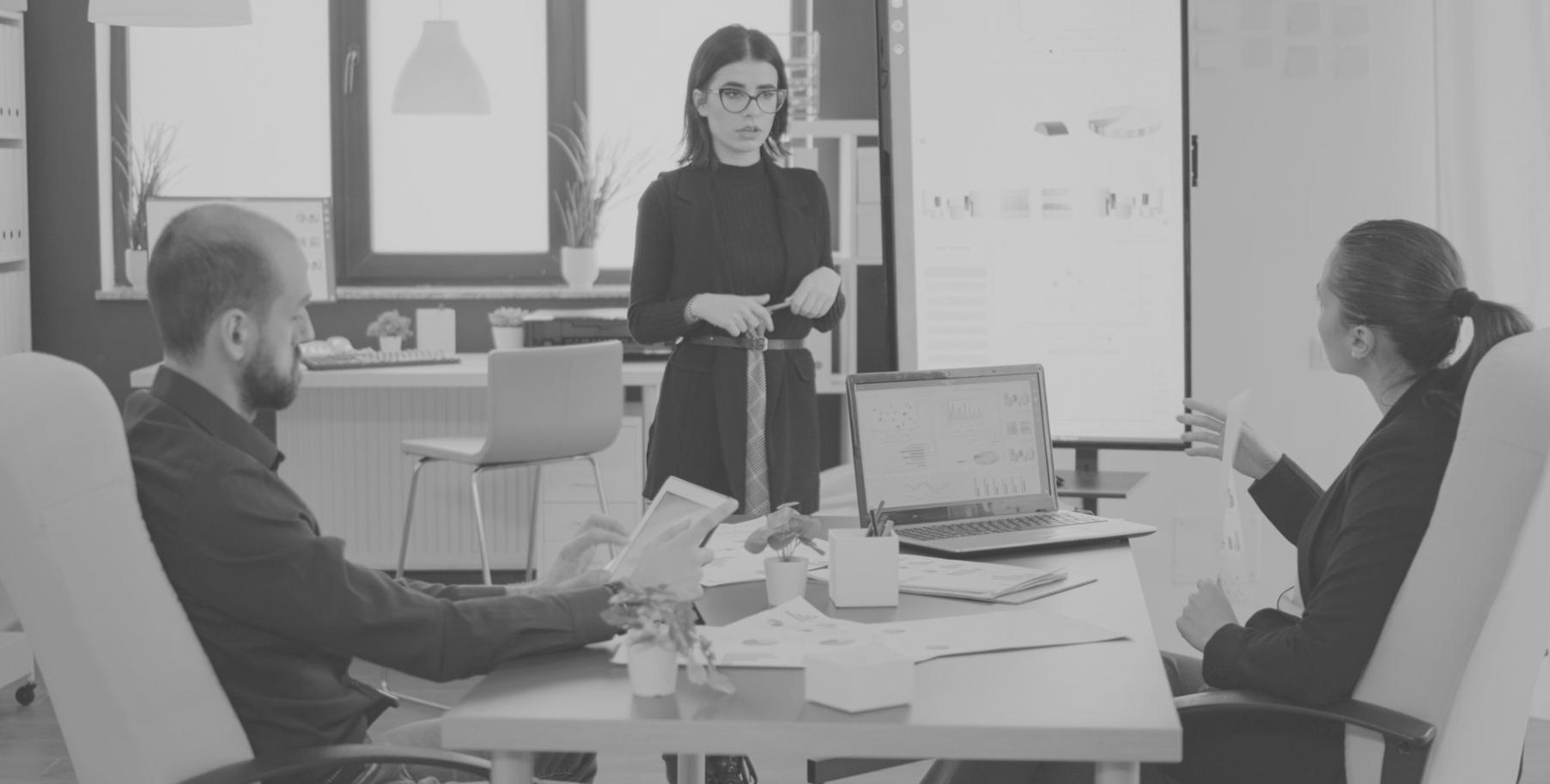 Professional analyzing financial charts and budget trends on computer screen